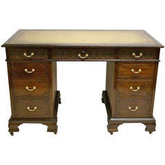 A late 19th century mahogany pedestal desk By Druce & Co.