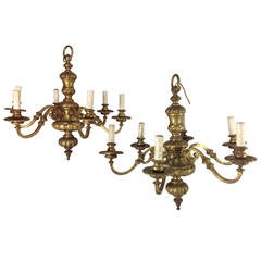 A pair of William & Mary style gilt brass chandeliers.