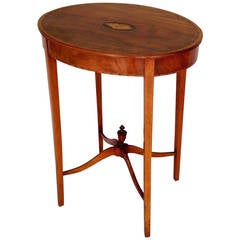 A late 18th century Sheraton period mahogany oval occasional table.