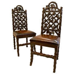 A Highly unusual pair of mid 19th century "Grotto" chairs