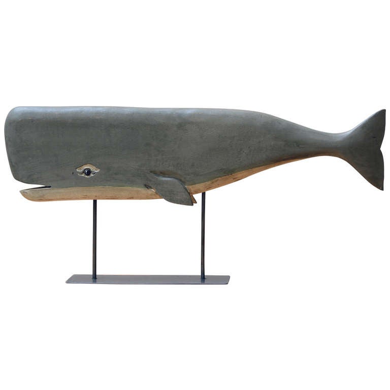 Decorated, carved wood model of a Whale