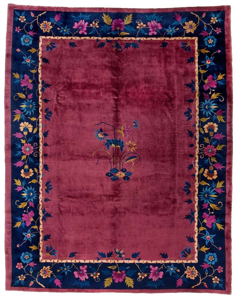 This vintage 1930’s Chinese art deco carpet was designed by Walter Nichols was mainly during the 1920's to 1930's. These carpets were woven with solid quality wool pile and cotton foundation. The unusual particular about these carpets, outside their