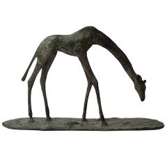 Small continental bronze of giraffe.