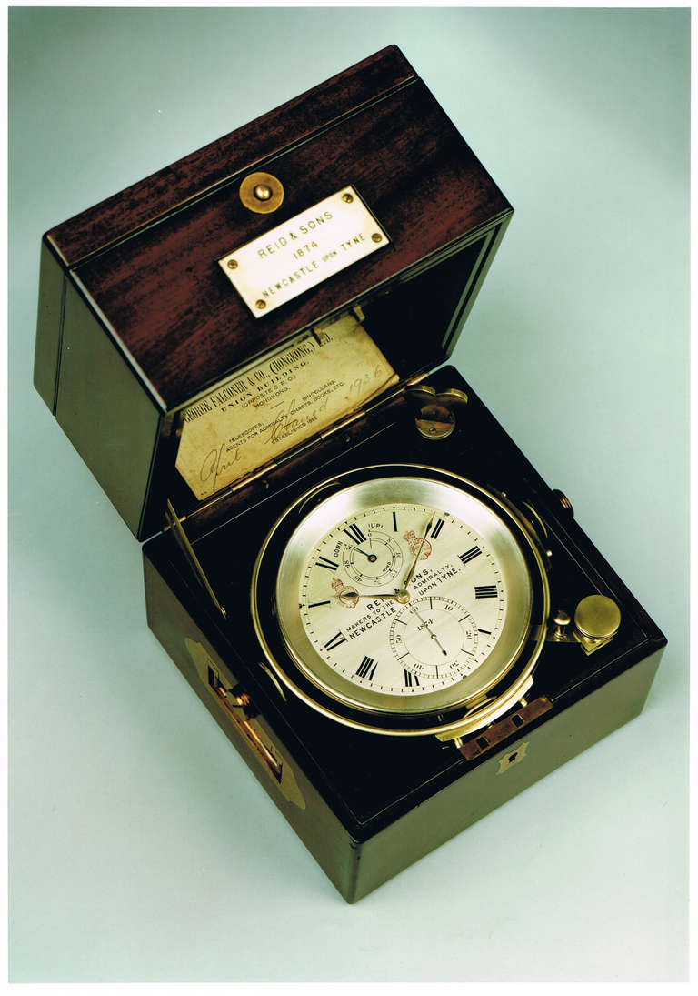A good quality mid 19th century mahogany cased marine chronometer of 2 day duration by Reid and Sons, makers to the British Admiralty. 

The circular silvered and engraved dial is fully signed and numbered 1874, has subsidiary second and up and