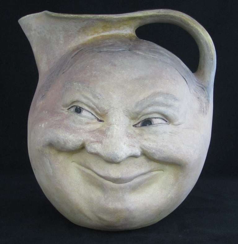 Large Martin Brothers Twp sided Face Jug. Minor restoration to glaze chips to rim.

MARTIN BROTHERS (1873-1914)
