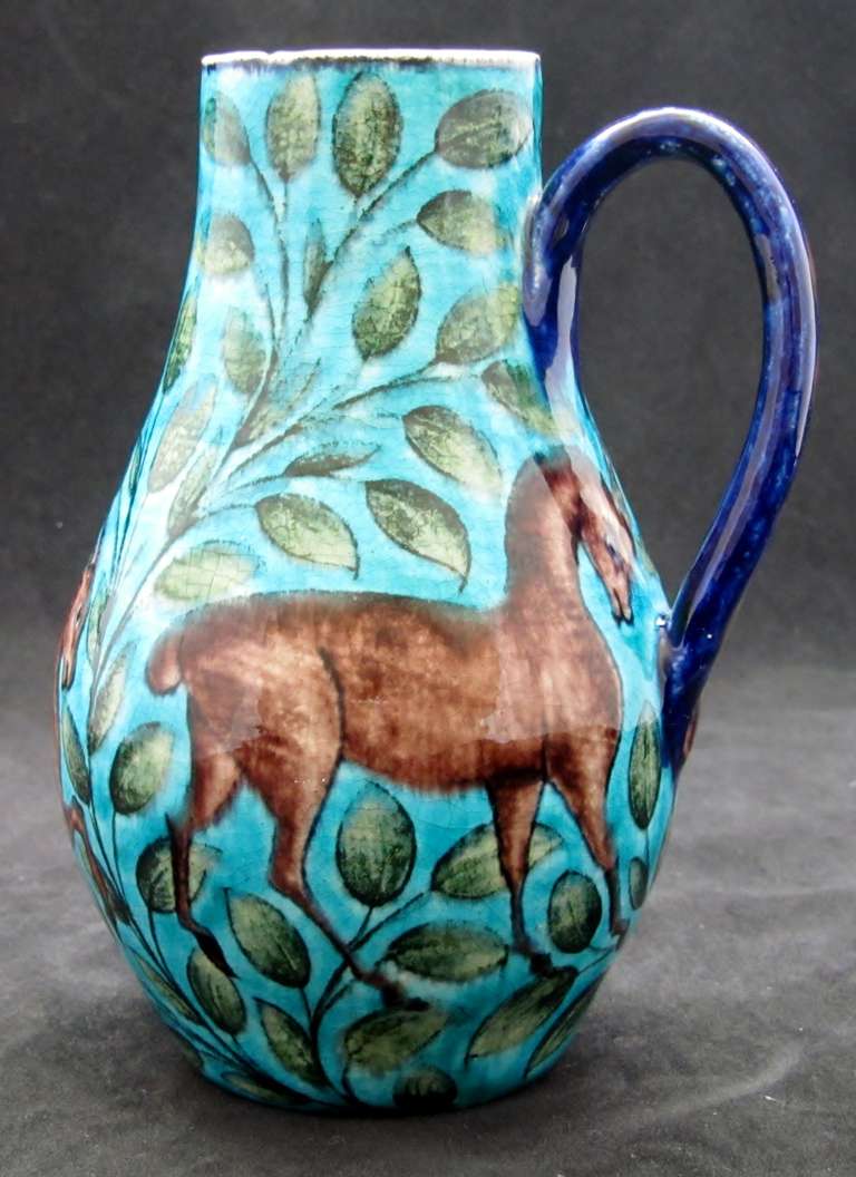 William De Morgan Jug decorated with Three Antelope signed by Joe Juster. Glaze frit to rim