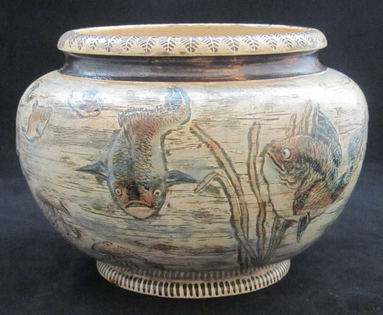 Martin Brothers Jardiniere decorated in relief with fish, eel and jelly fish.