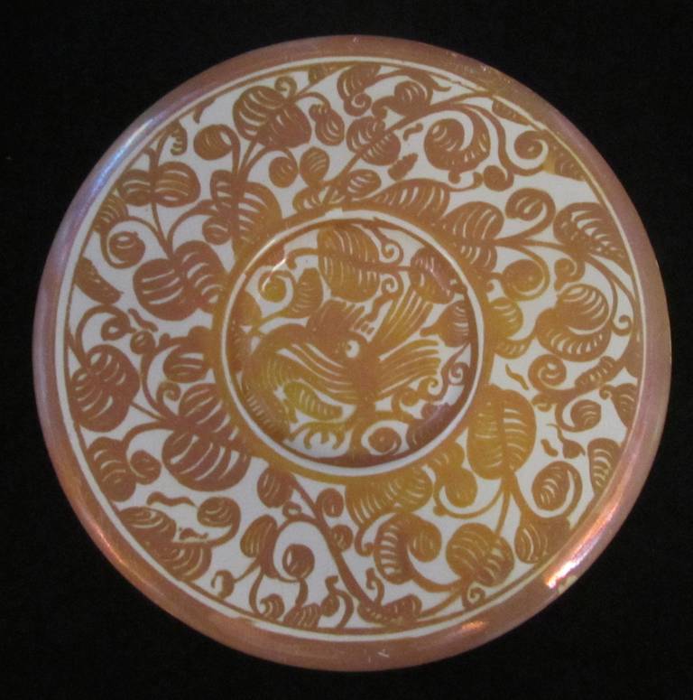 William De Morgan Plate in a Golden Lustre Glaze decorated with central stylised bird