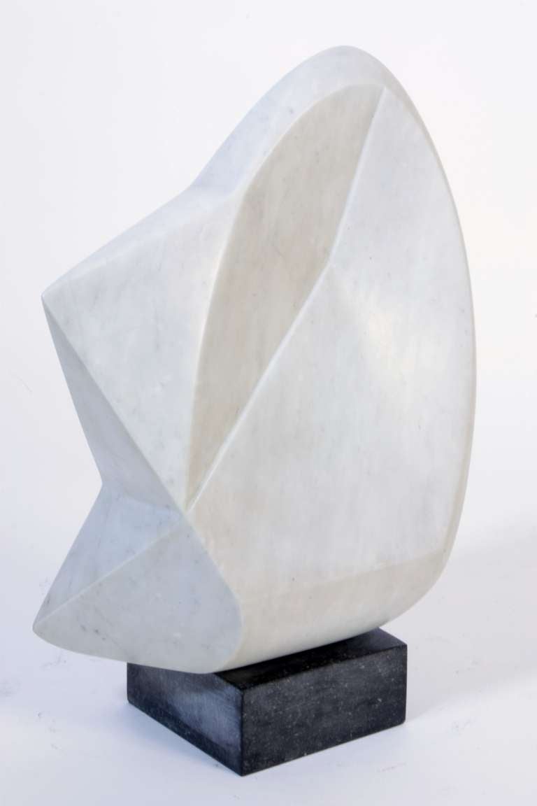 Unique piece. White marble sculpture signed and dated on the side.
Black marble base.