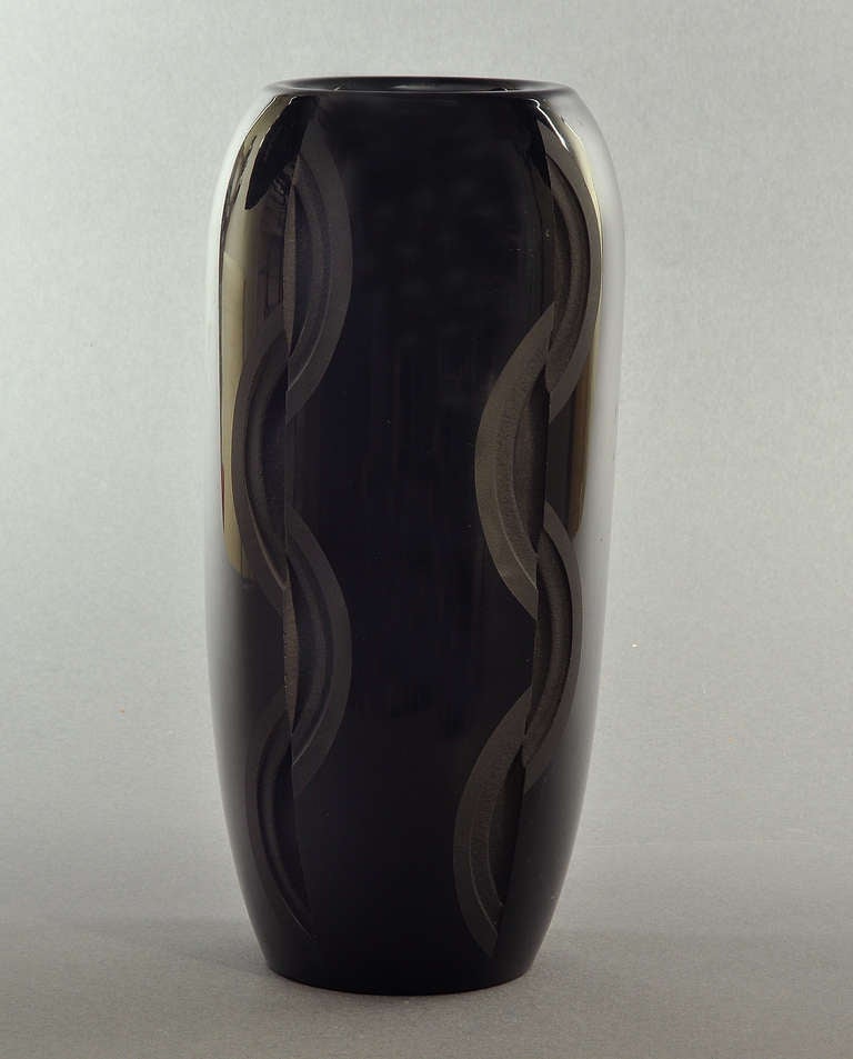 Tall Jean Luce geometric black etched vase. Circa 1930.
Signed with the artist monogram.

