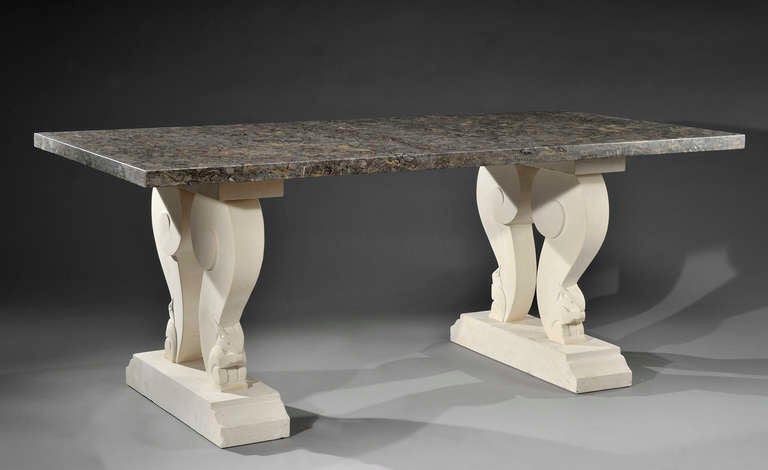 Dining room table with base in white stone shaped like stylized squirrels and rectangular marble top. It might be attributed to the sculptor Edouard-Marcel Sandoz, circa 1930.