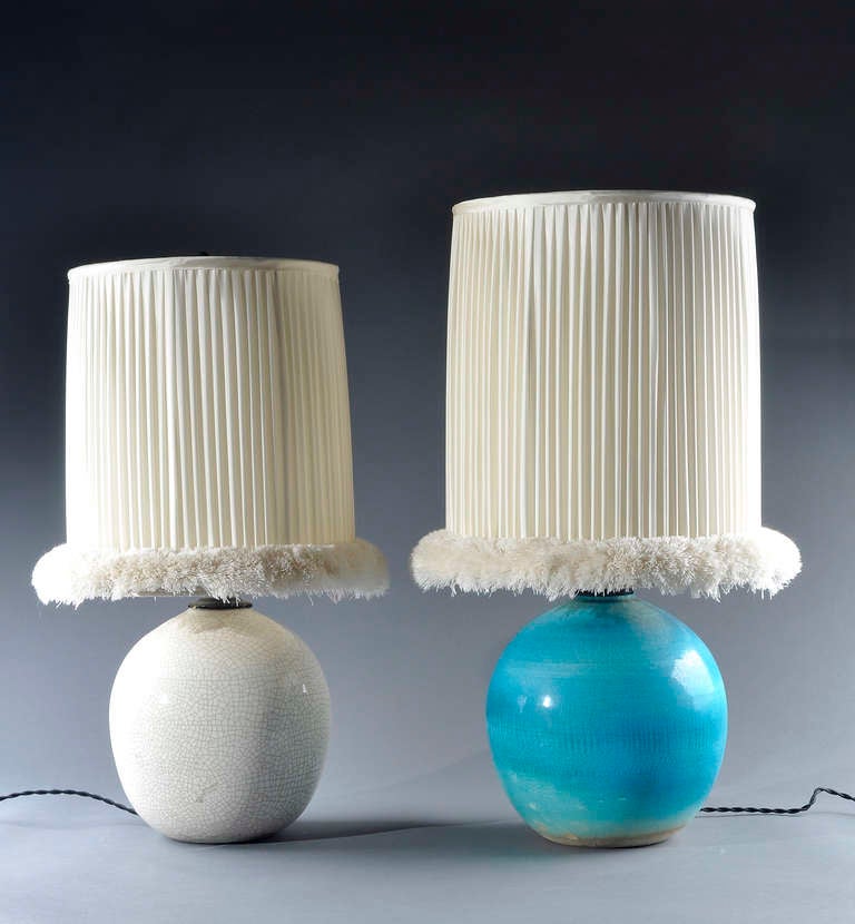 Jean Besnard - Two Earthenware lamps Circa 1930. Both are signed with the artist monogram. Please note that the price is for each lamp and that the dimension is for the blue one, a little bit bigger than the white one.
The white crackled lamp was