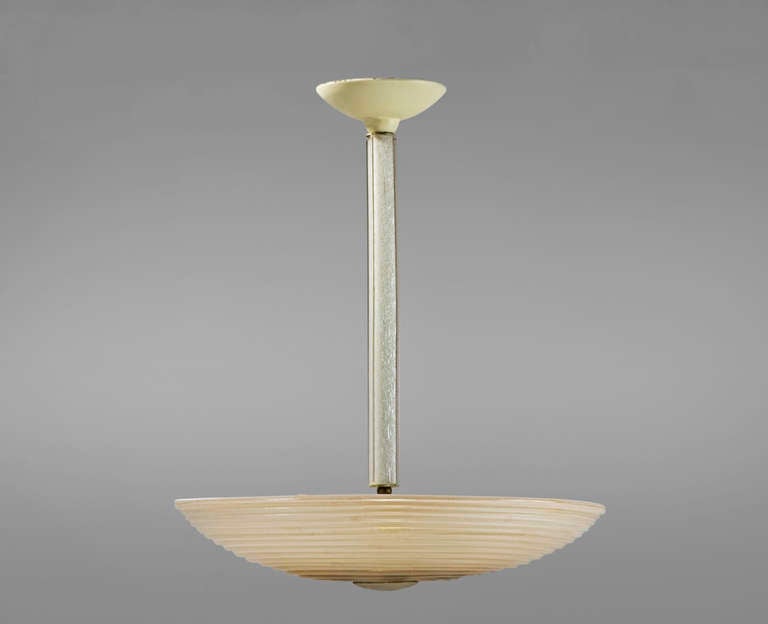 Plain transparent blown glass in «latimo» with inclusions of gold specks. Beige lacquer metal top. Circa 1930.

IMPORTANT NOTICE :

-	Free shipping from Paris to New York. For others destinations, please ask us.
-	All our pieces are sold with a