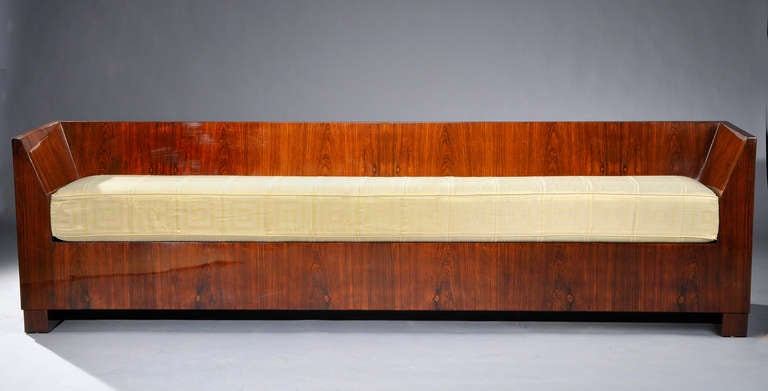 Long modernist mahogany Art Deco bench attributed to Blanche Klotz. New Art Deco style fabric for the cushion, circa 1930.