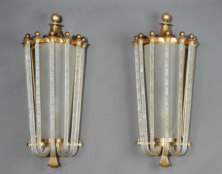 Rare Pair Of Sconces in Murano glass and bronze by Véronèse Paris. The design is probably by Jules Leleu. Circa 1950. Made in 
