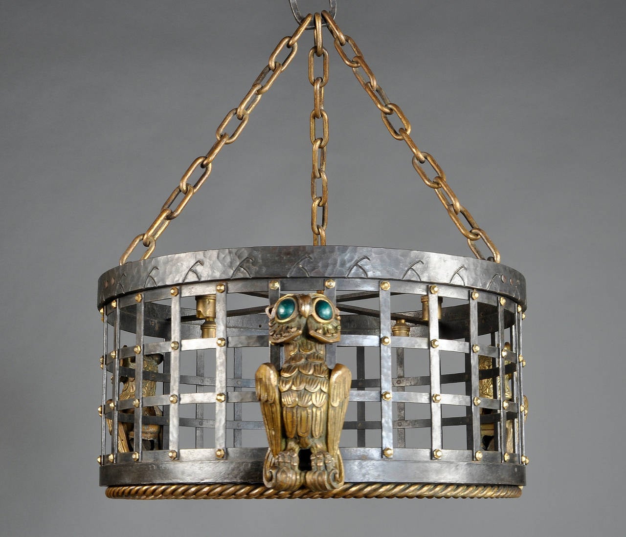 Adalbert Szabo Rare Wrought Iron and Bronze Ceiling Light Circa 1925
The eyes of the owls are in painted wood.
Wrought Iron and bronze parts in perfect condition, the piece is sold with its original silk witch is not in good condition