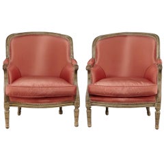 Pair of Louis XVI-style Crème-Painted Bergeres