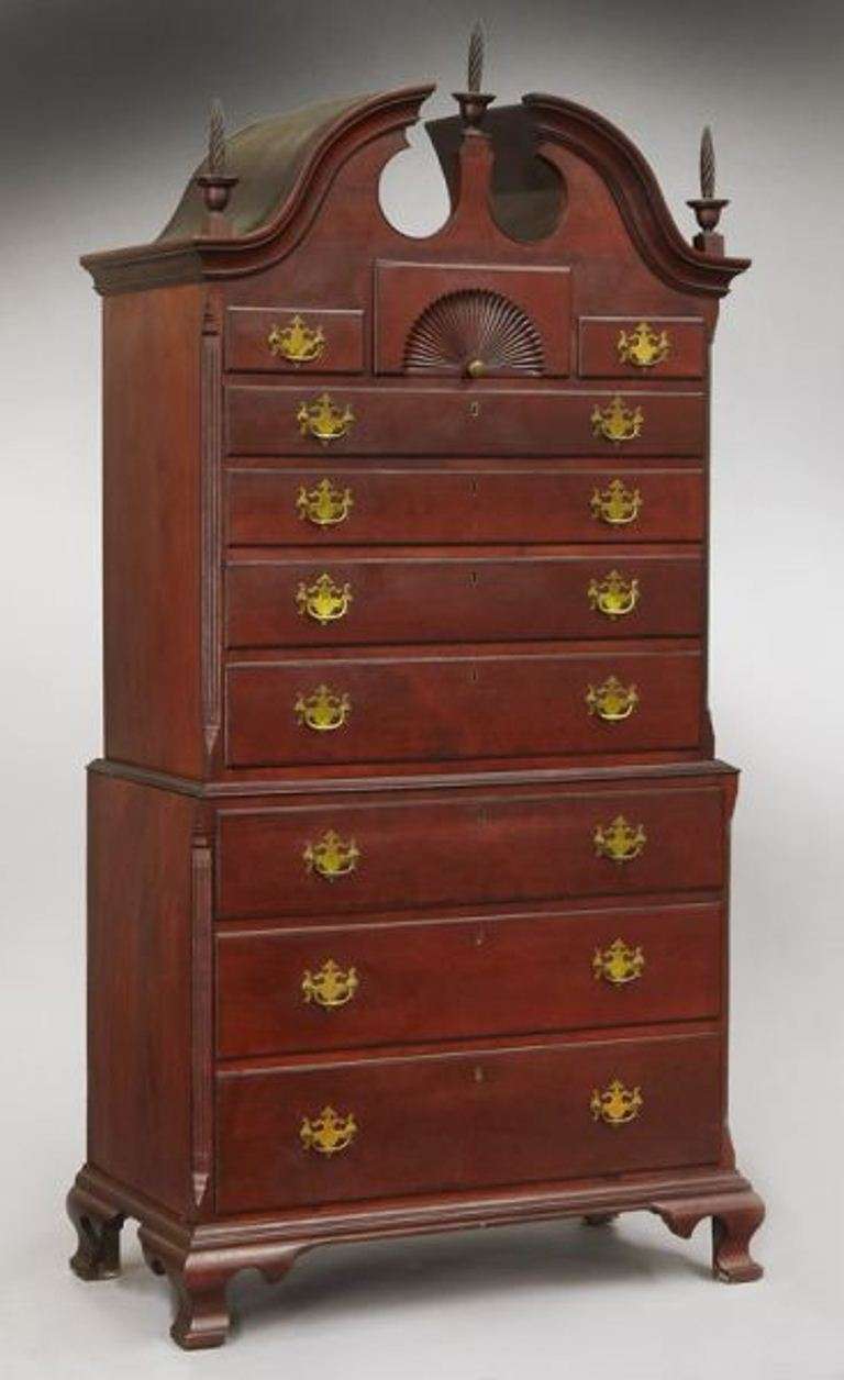 Period American Chippendale cherry bonnet top chest on chest, molded swan neck pediment, spiral turned finials, fan-carved upper drawer & shaped ogee bracket feet. Poplar & pine secondary woods. Probably Connecticut River Valley.