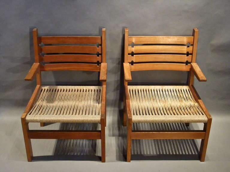 Pair of 1960's architectural armchairs with woven hemp seats
