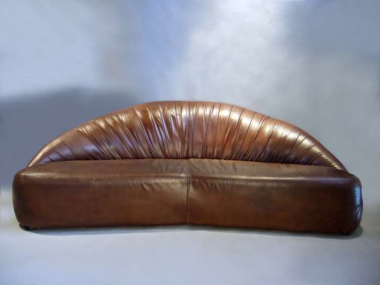 1970's French semi circular brown leather sofa

