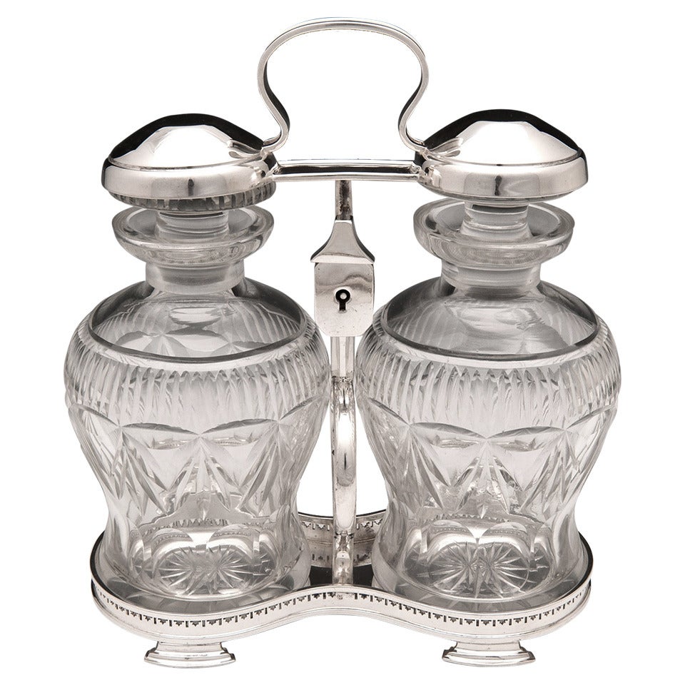 Silver Plated Spin Top Cut Glass Tantalus Decanters