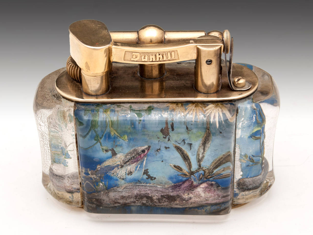 Aquarium table cigarette lighter by Alfred Dunhill. 

This 