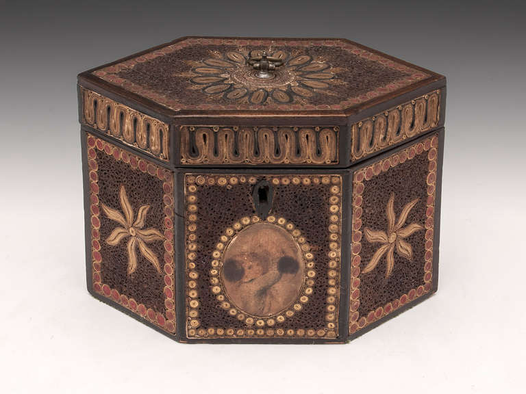 (This tea caddy is currently on display at  “A Tea Journey: from Mountain to the Table” at Compton Verney until the 22nd september.)
Rare Paper Scroll tea caddy with fantastic decoration and color. The front has a print of a child holding a kitten.