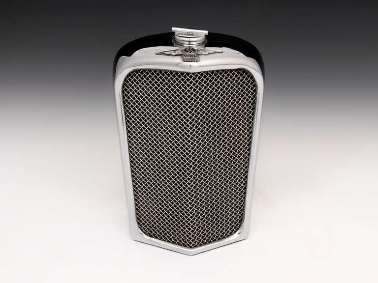 Superb Jaguar Ruddspeed Decanter with chrome radiator grill and enameled SS Jaguar badge. 

The 