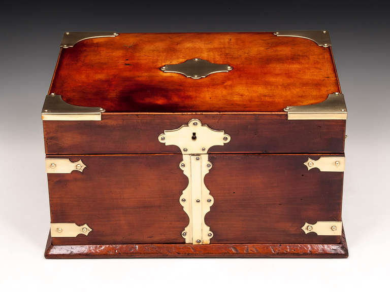 Games compendium in untouched Italian walnut with brass decorative corner quadrants, escutcheons and sturdy carry handles. 

The interior lid houses a double sided Chess or Halma Board. 
Halma, from the Greek meaning 