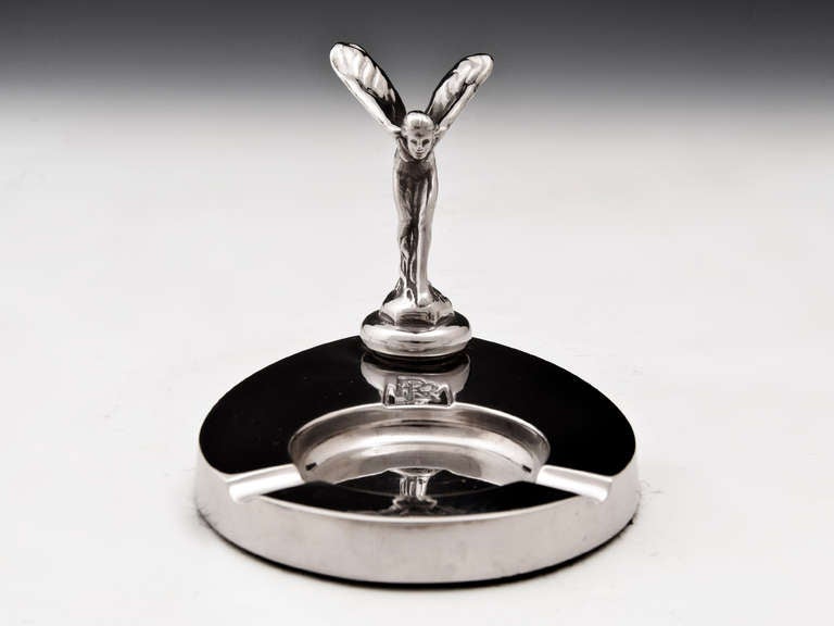 Silver-Plate Rolls royce ashtray. This ashtray features a clean simplistic look with two cigarette rests. The Rolls Royce logo has been stamped into the base, standing over this is the iconic 