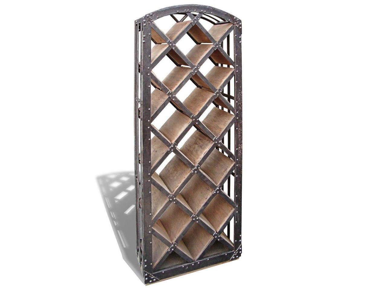 Rustic wrought iron and wood wine rack.