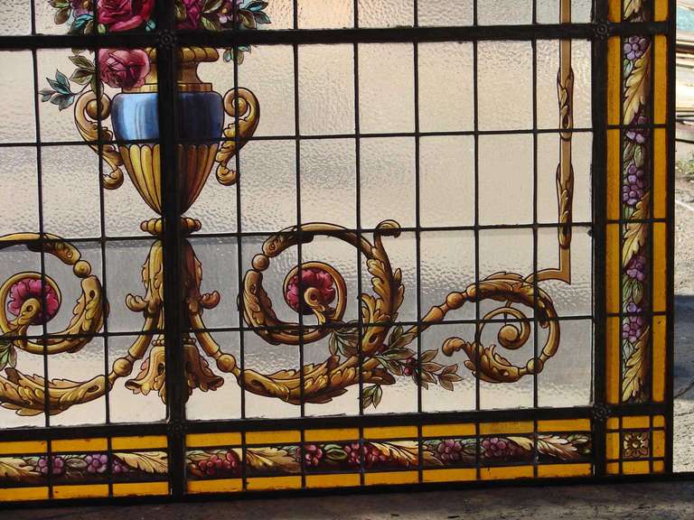 This wonderful leaded & hand painted glass panel made in Iron, provides all the design to lift up a room and provide that elegance you are looking for.