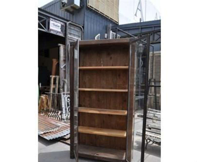 This beautiful Retro-style wooden wardrobe with wrought iron glass doors and wrought iron elements