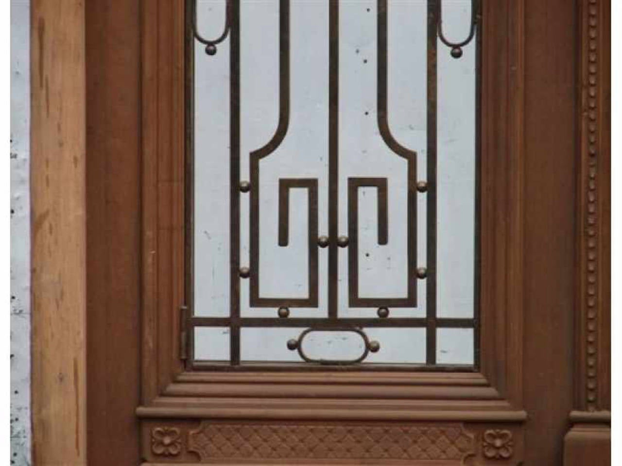 Tall double front door with low panel. Amazing hand forged wrought iron insert. Fully restored. Pre-hung. You will receive a large amount of sunlight. Ready for you. 

DETAILS:

Overall Dimension:71 1/2