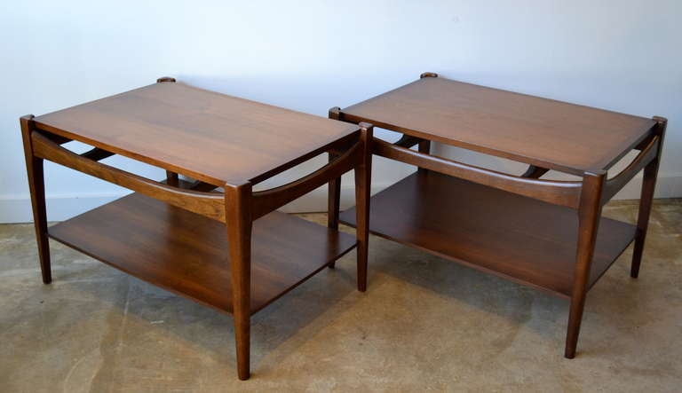 beautiful walnut side tables with great lines.