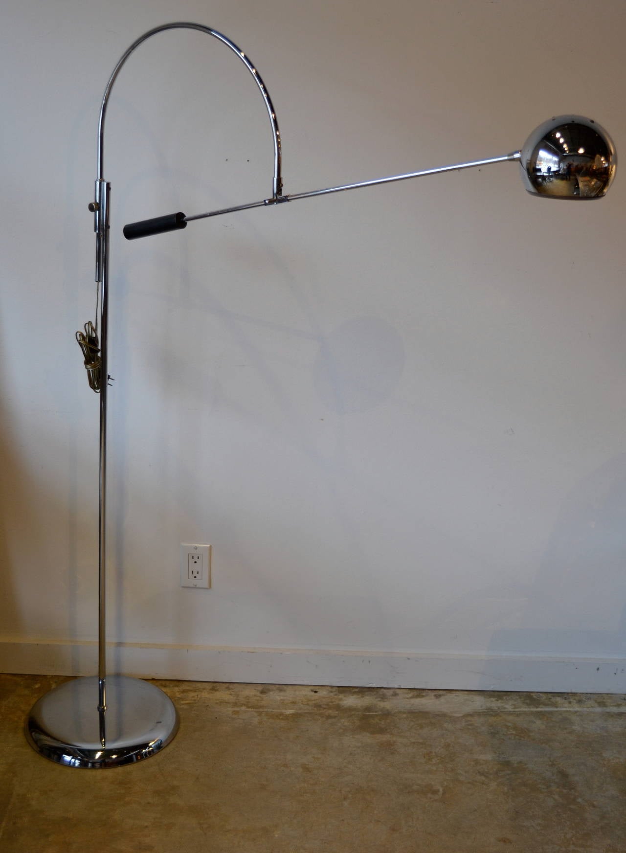 sonneman chrome floor lamp, adjustable arm.
