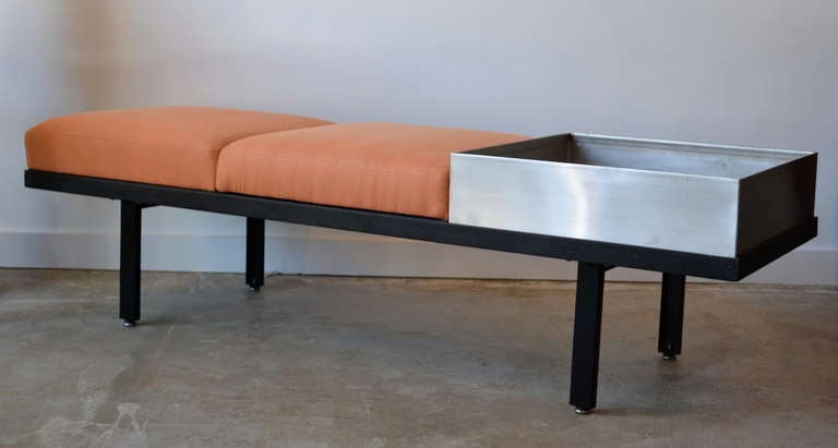 George Nelson bench with stainless steel planter box, new tangerine linen upholstery.
