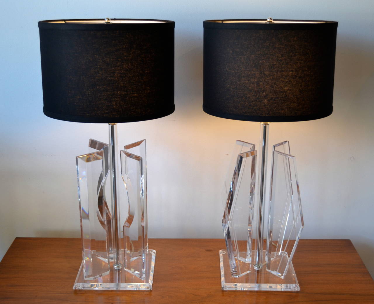 Outstanding large Mid-Century Modern sculptural lucite and chrome table lamps.  Each with unique shape, 1 inch thick lucite panels.