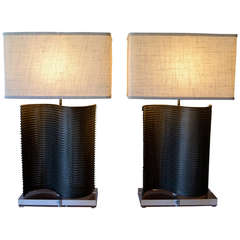 industrial brutalist conveyor belt table lamps in the style of harry bertoia