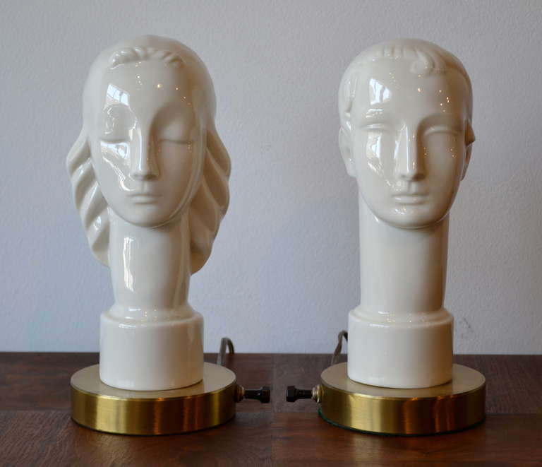 His and her busts, very Art Deco with brass base.