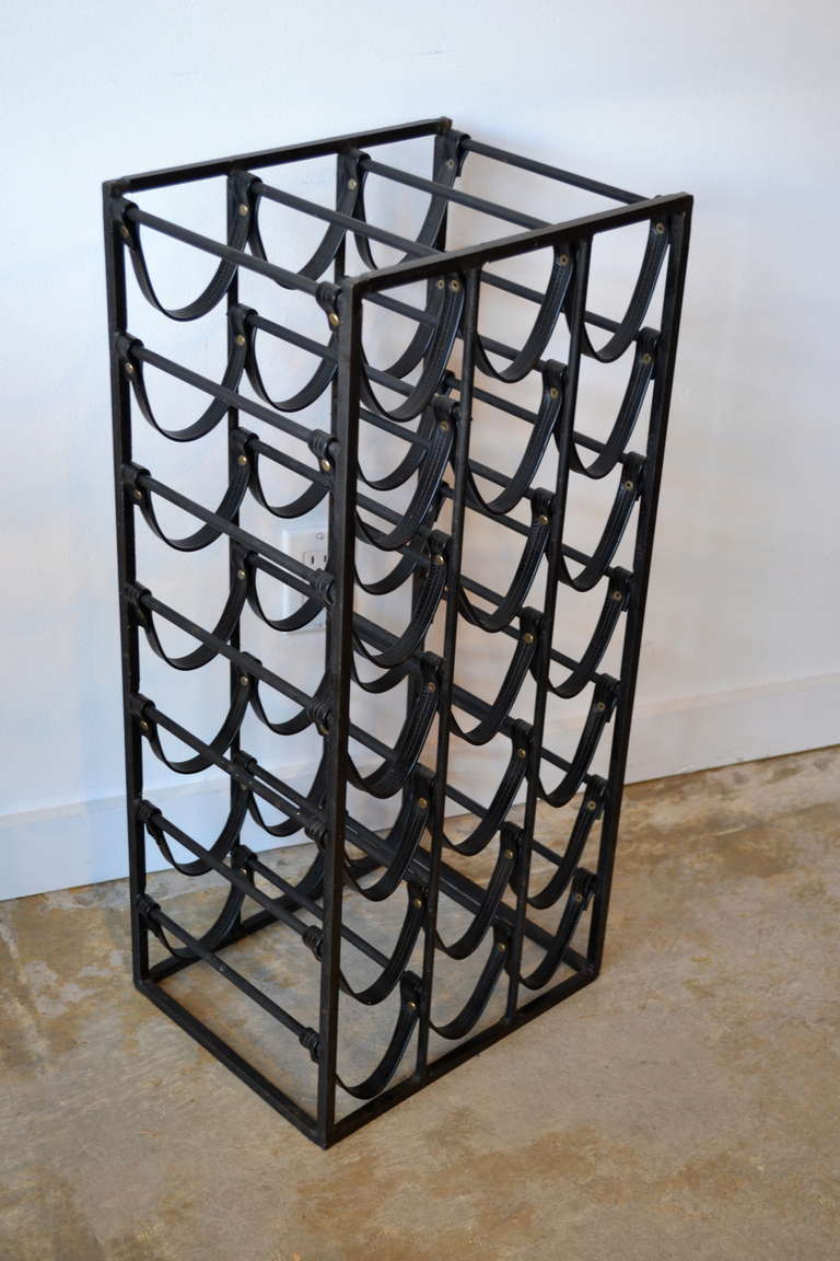 mid century wrought iron and leather wine rack in the mid century wrought iron and leather wine rack in the