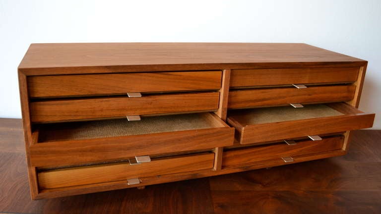 dresser top jewelry case in the manner of george nelson.  walnut veneer with aluminum slider pulls, removable drawers.  restored.