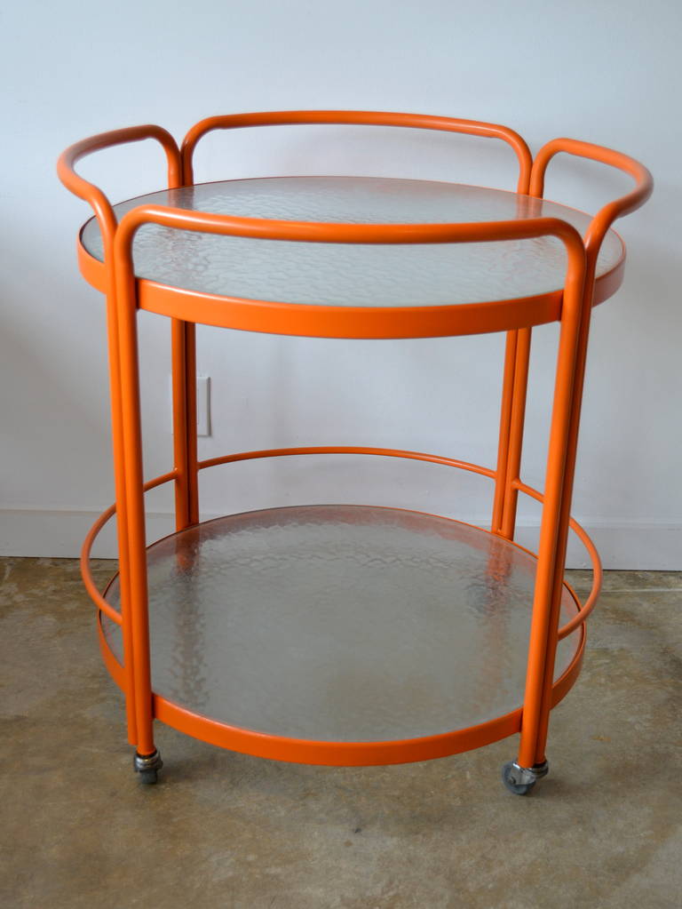 Orange! Very large vintage two-tiered bar cart or server with wavy glass trays. great for indoor or outdoor entertaining. great poolside! or on patio! on casters, restored.