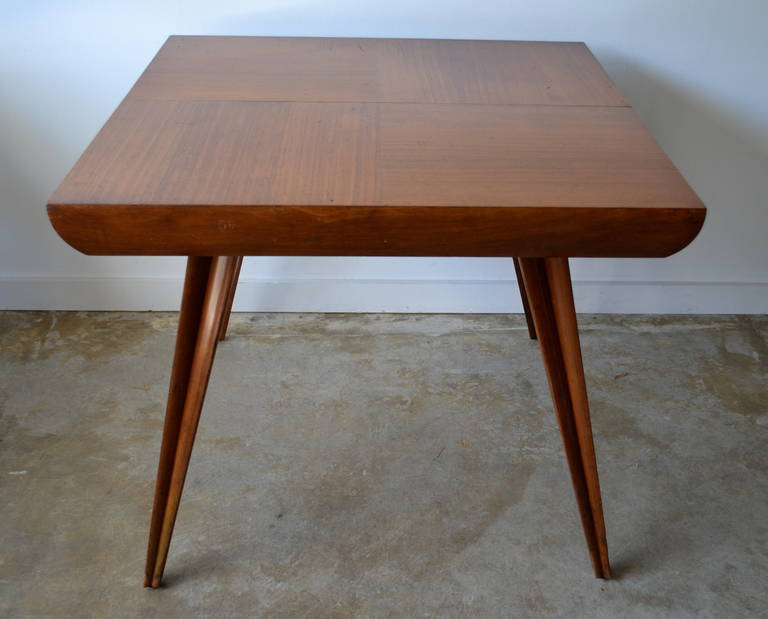 Early 1950s Vladimir Kagan custom dining table for private client, 1950s, walnut with scalloped legs. One owner and used daily for over 60 years. Wear and scratches, but all original, comes with leaf.