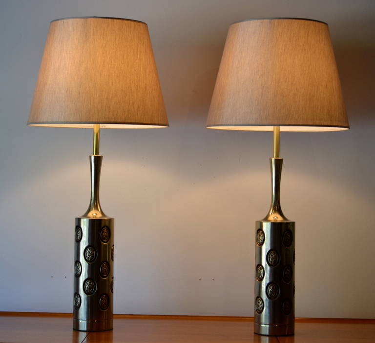 Very elegant pair of Laurel lamps, brass finish with embossed oval pattern, rewired, shades not included. Nice large-scale. Beautiful soft patina.