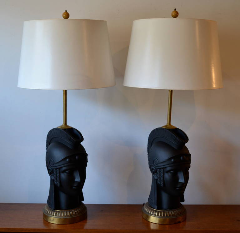 Large very cool pair of matte black cast plaster gladiator table lamps, restored and rewired.
