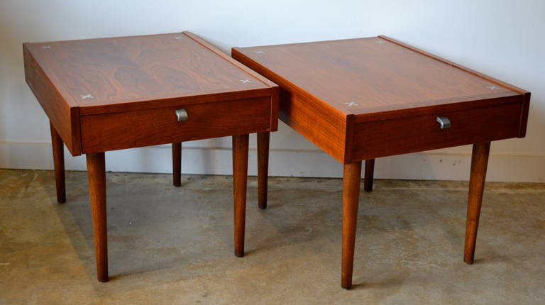 Beautiful walnut veneered side tables with brass inserts, designed by Merton Gershun, 1960s. Great as side tables or nightstands. Excellent condition.