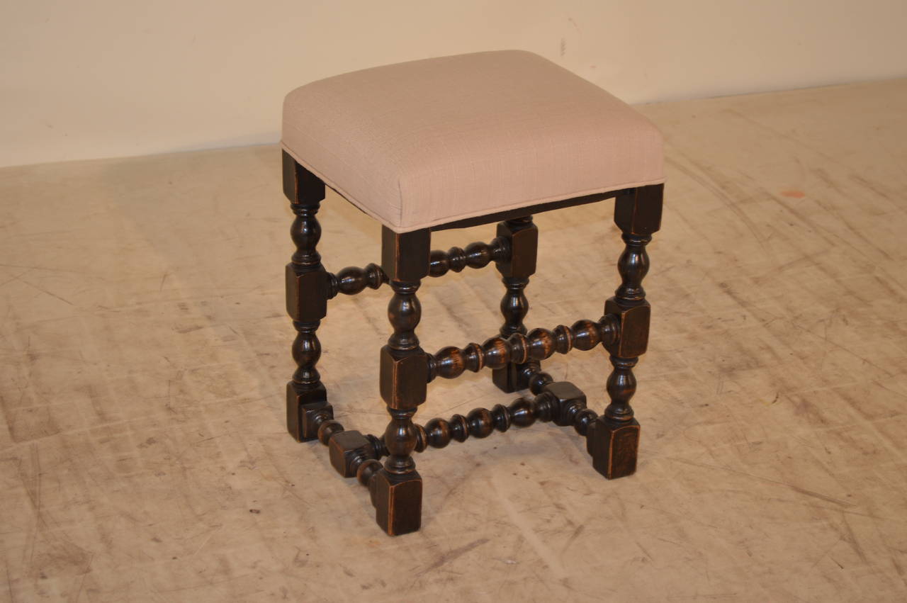 Lovely hand turned oak stool with newly upholstered linen top.