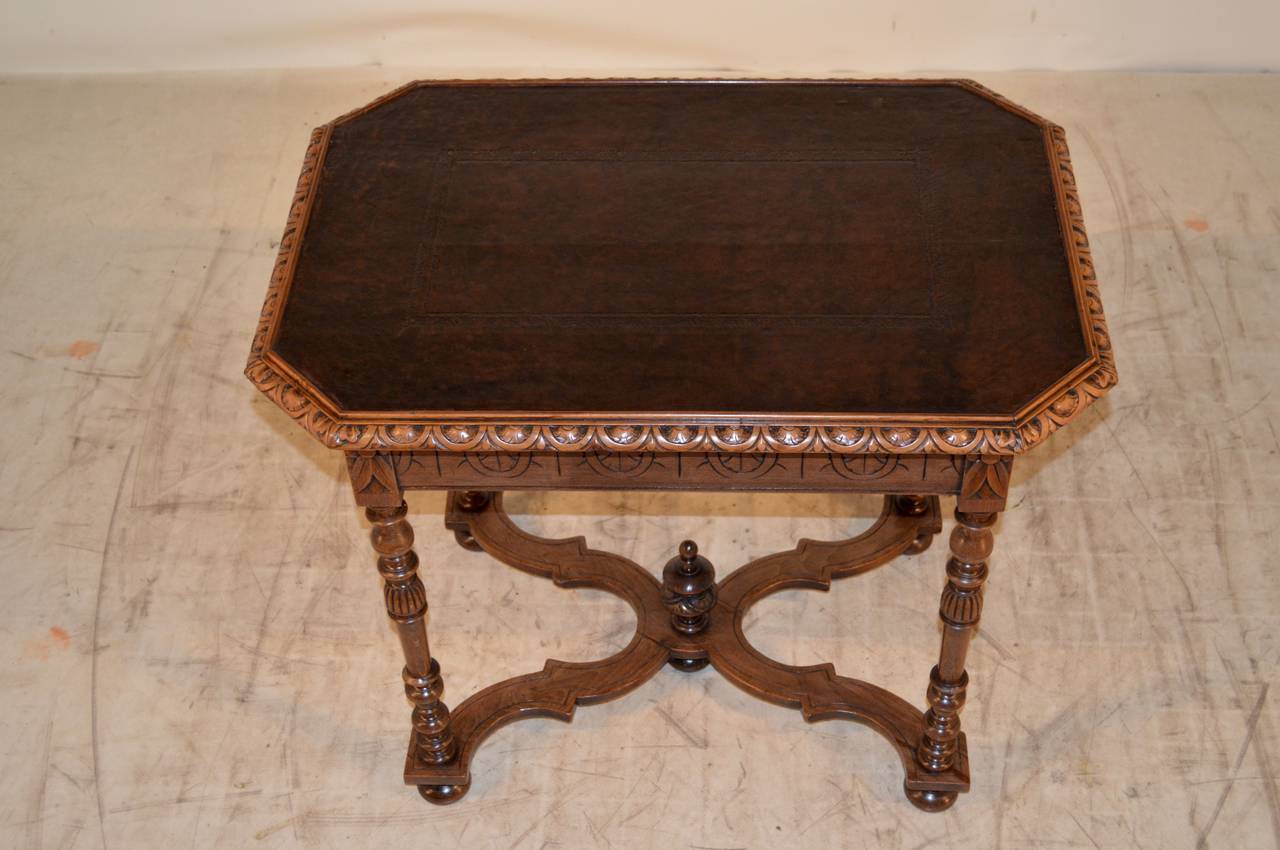 Carved 19th Century French Walnut Table with Leather Top