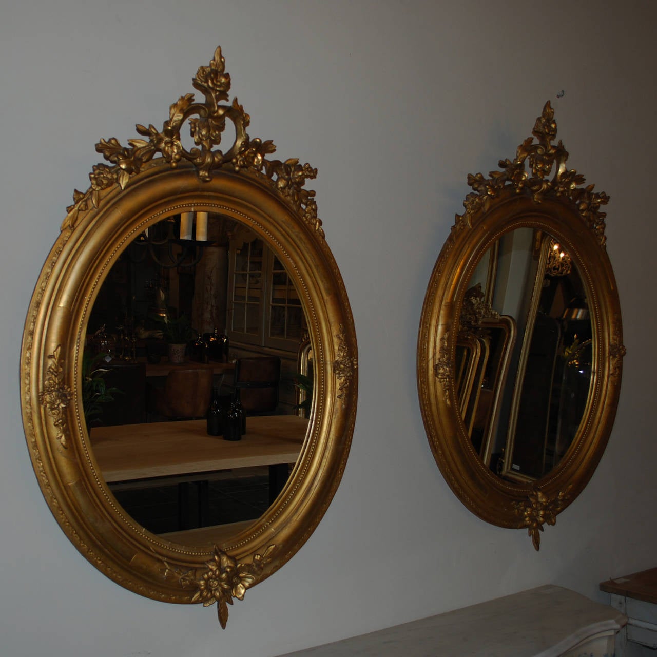 French 19th Century Pair of Gold Gilded Oval Mirrors